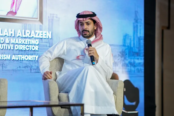 Speaker participating in a panel discussion