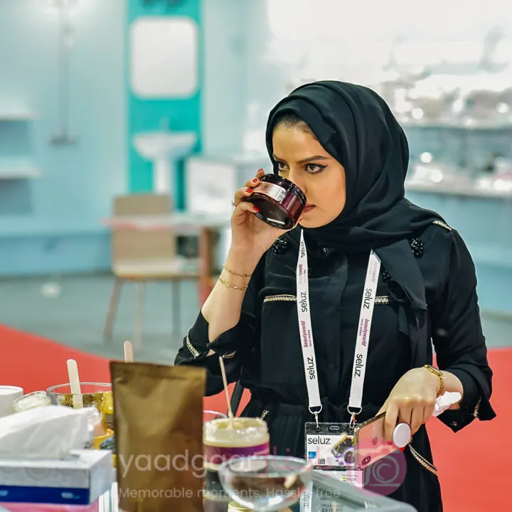 Visitor exploring fragrance products