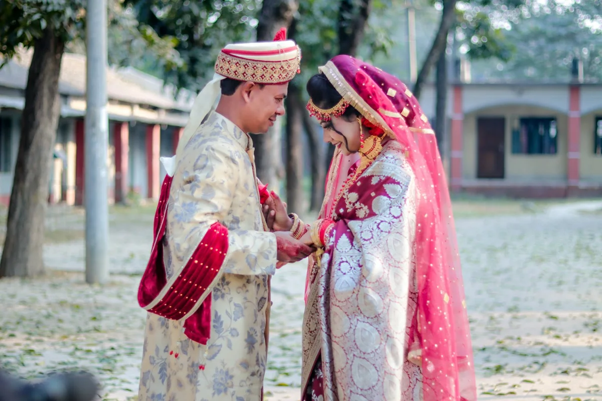 Couple photographed at a wedding celebration